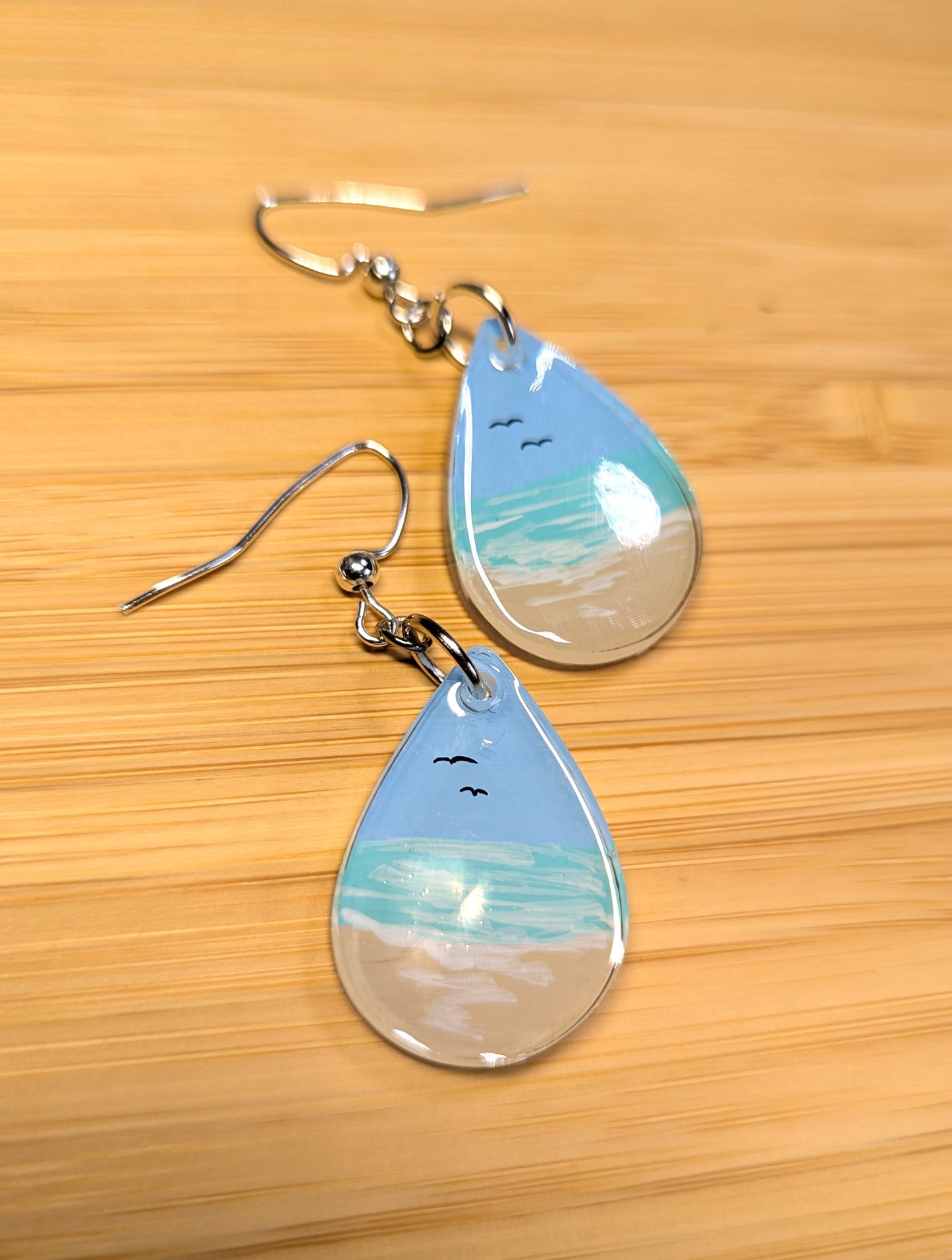 Gentle beach hand painted resin earrings