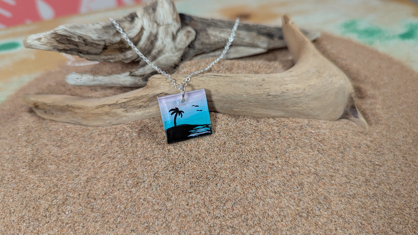 Malibu Vibes pink and teal sunset silhouette palm tree necklace