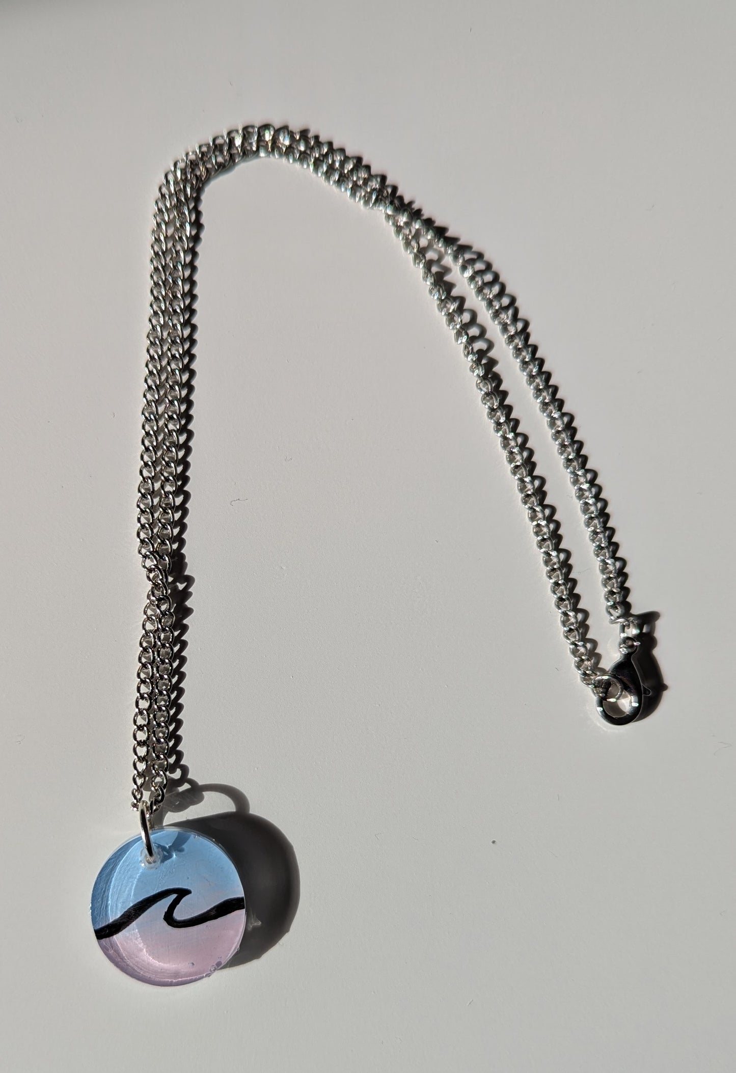 Simple wave pink and blue hand painted surfer girl resin necklace