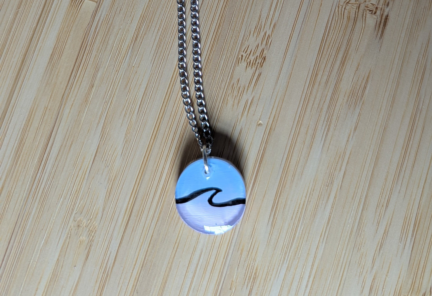 Simple wave pink and blue hand painted surfer girl resin necklace