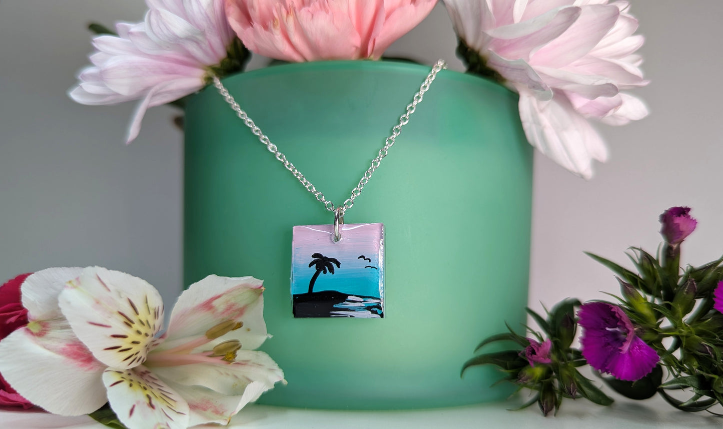Malibu Vibes pink and teal sunset silhouette palm tree necklace