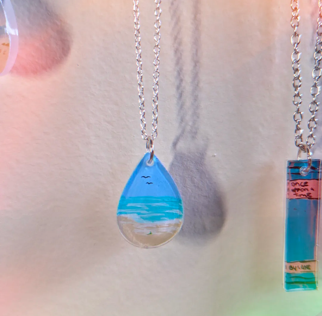 Gentle beach hand painted resin necklace